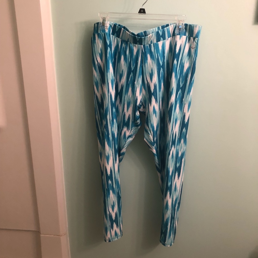 Two pairs of ankle-length exercise leggings.